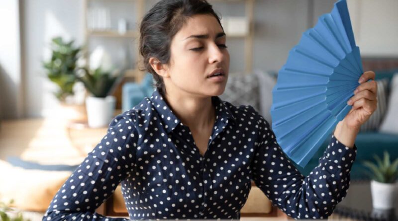 Ondas de calor durante a menstruação: sintomas e causas