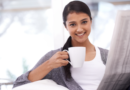 smiling woman drinking coffee Sunday things to do