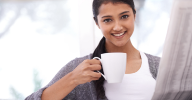 smiling woman drinking coffee Sunday things to do