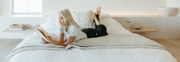 Remi Ishizuka reading in calming bedroom