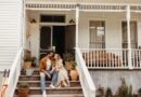 Couple smiling on front porch